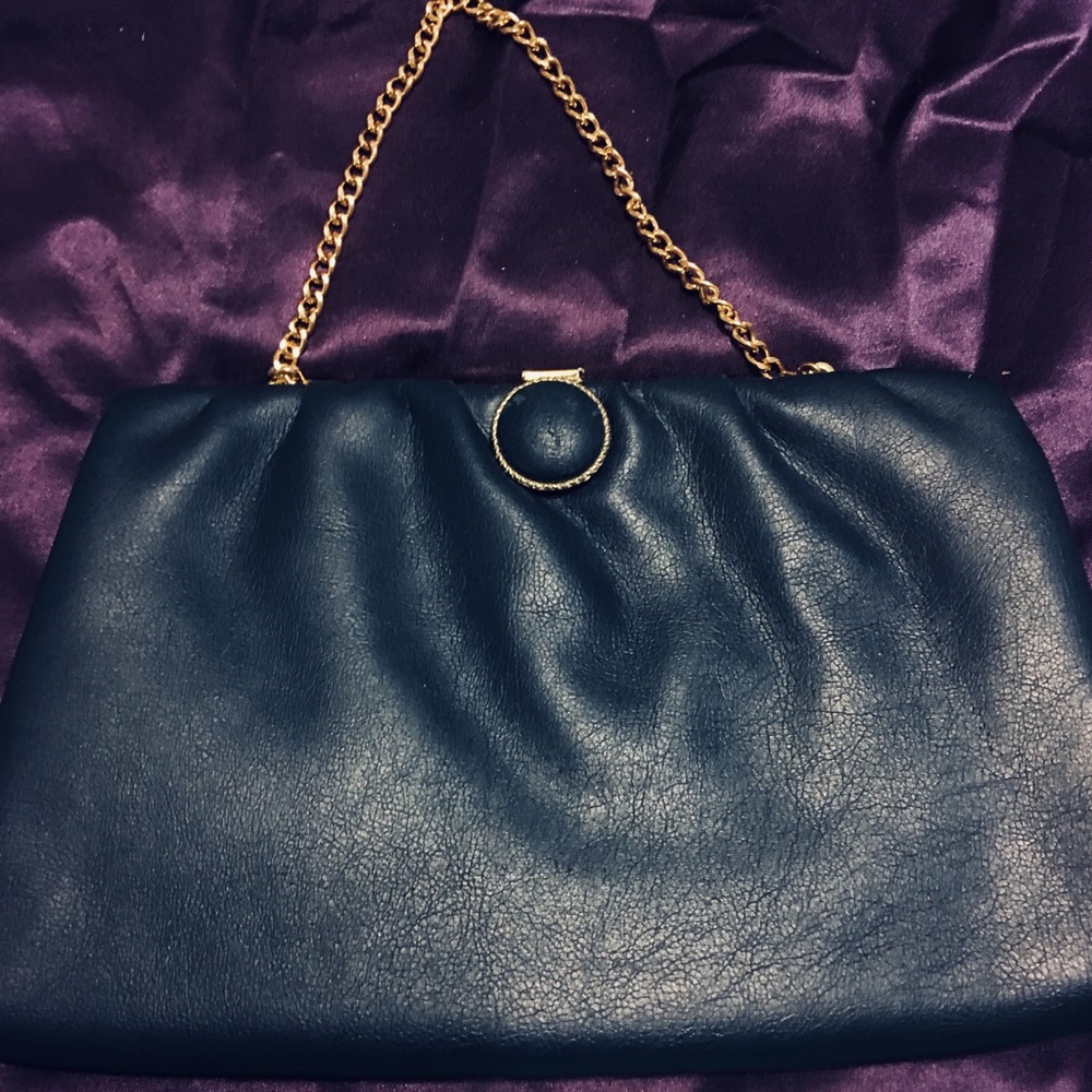 Pretty dark blue evening bag with gold chain strap